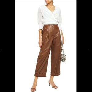 Maje Lusty cropped ruffled Swiss-dot wrap blouse